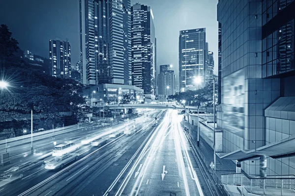 Traffic with blur light through city at night — Stock Photo, Image