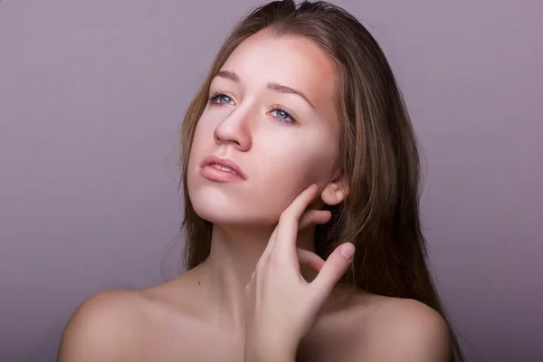 Studio beauty portrait of a beautiful young woman — Stock Photo, Image