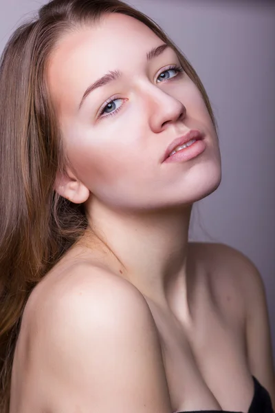 Studio beauty portrait of a beautiful young woman Royalty Free Stock Images