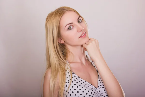 Studio portrait of a beautiful young blonde woman with natural make-up — Stock Photo, Image