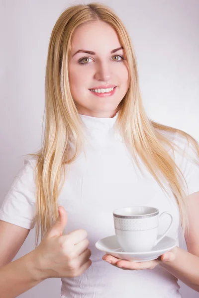 Portrait of a beautiful young blonde woman in the studio on a white background. — Stock Photo, Image