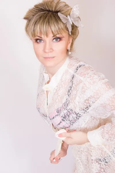 Portrait of a beautiful young blonde woman in sexy lace blouse. — Stock Photo, Image