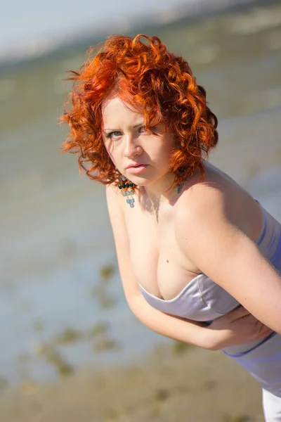 Gorgeous red-haired woman on a walk in the park. Young girl on the nature — Stock Photo, Image