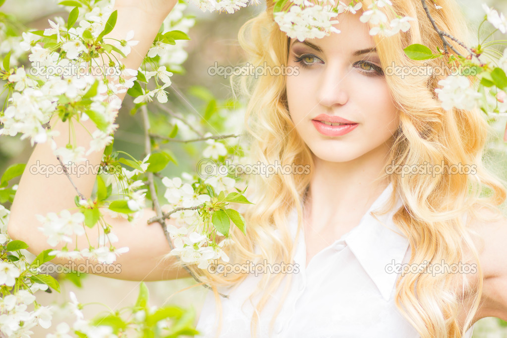 Spring portrait of a beautiful young blonde woman.