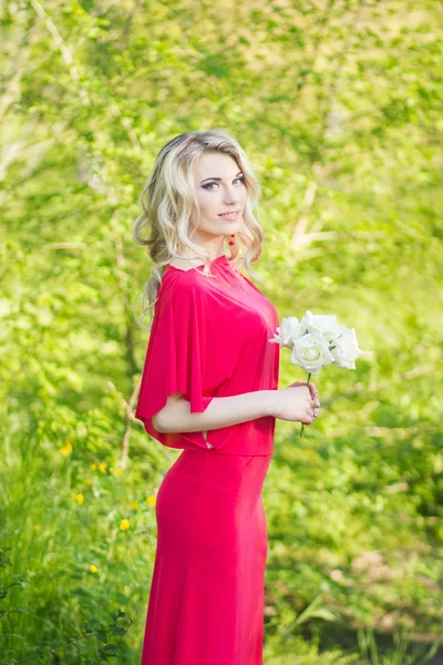 Portrait of a beautiful young blonde woman — Stock Photo, Image