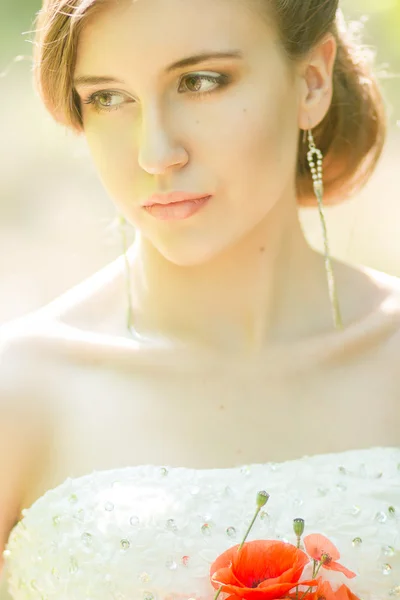 Beautiful bride outdoors - soft focus — Stock Photo, Image