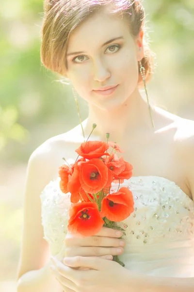 Beautiful bride outdoors - soft focus — Stock Photo, Image