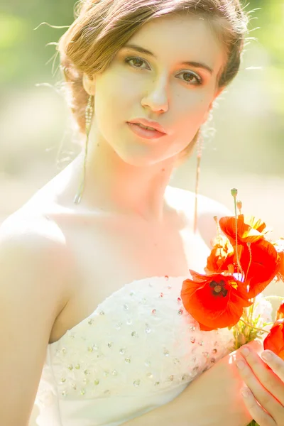 Beautiful bride outdoors - soft focus — Stock Photo, Image