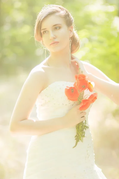 Beautiful bride outdoors - soft focus — Stock Photo, Image