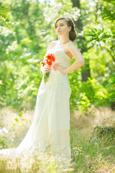 Beautiful bride outdoors - soft focus — Stock Photo, Image