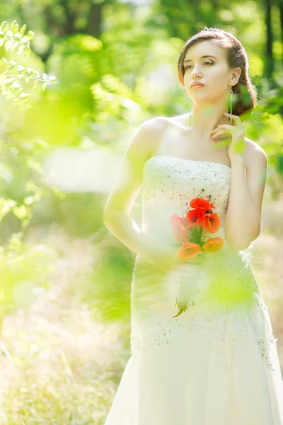 Beautiful bride outdoors - soft focus — Stock Photo, Image