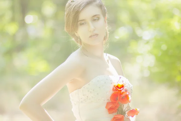 Beautiful bride outdoors - soft focus — Stock Photo, Image