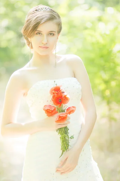 Beautiful bride outdoors - soft focus — Stock Photo, Image