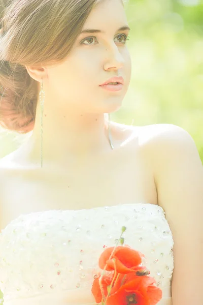 Beautiful bride outdoors - soft focus — Stock Photo, Image