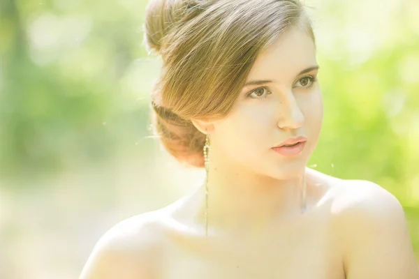 Beautiful bride outdoors - soft focus — Stock Photo, Image