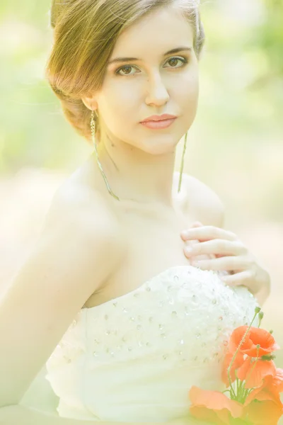 Beautiful bride outdoors - soft focus — Stock Photo, Image