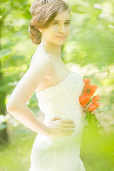 Beautiful bride outdoors - soft focus — Stock Photo, Image