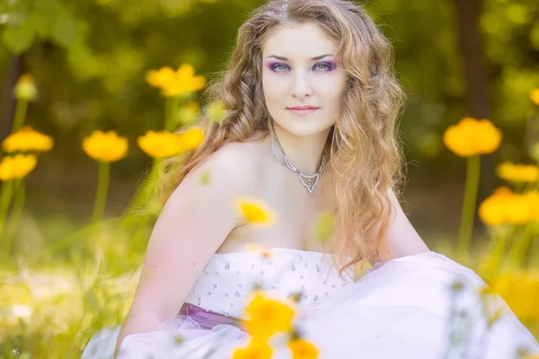 Portrait of beautiful young bride with long curly hair — Stock Photo, Image