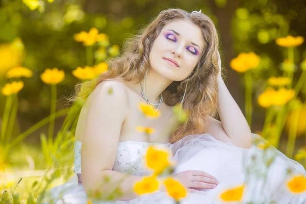 Portrait of beautiful young bride with long curly hair — Stock Photo, Image