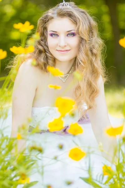 Portrait of beautiful young bride with long curly hair — Stock Photo, Image