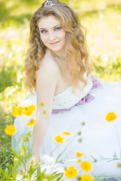 Portrait of beautiful young bride with long curly hair — Stock Photo, Image