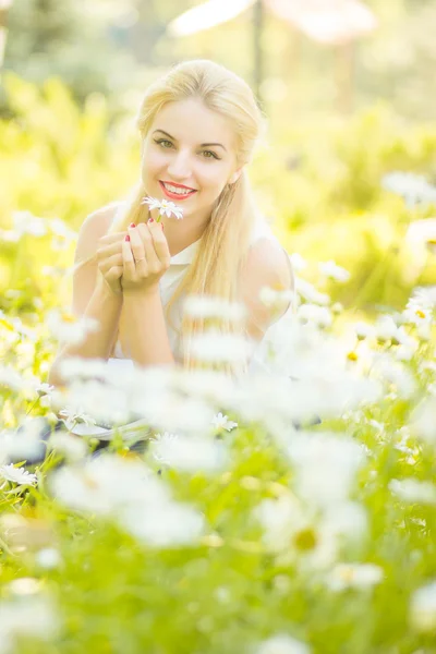 Outdoor summer portrait of young pretty cute blonde girl. Beautiful woman posing in the park — Stock Photo, Image