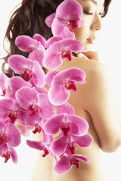 https://st.depositphotos.com/1758504/2330/i/450/depositphotos_23307704-stock-photo-asian-woman-with-flowers.jpg