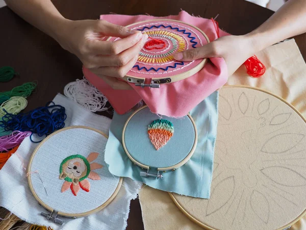 artist home living space woman leisure hobby hand craft embroidery mandala spiritual mental health healing mind pattern handmade design illustration art workshop selective focus