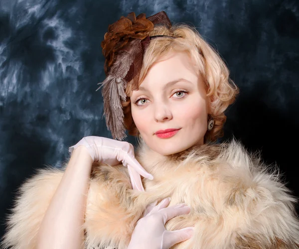 Beautiful woman wearing fur and silk adornment — Stock Photo, Image