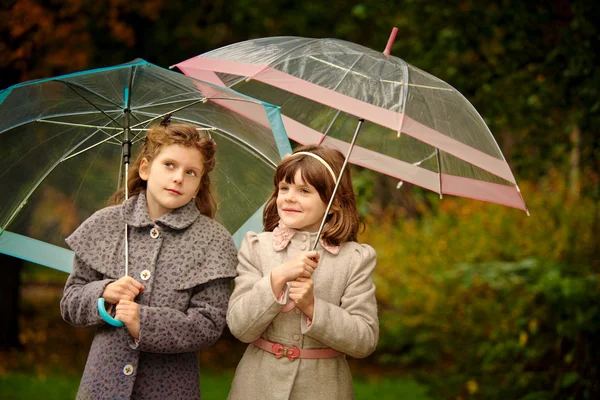 Two girls in autumn park — Stock Photo, Image