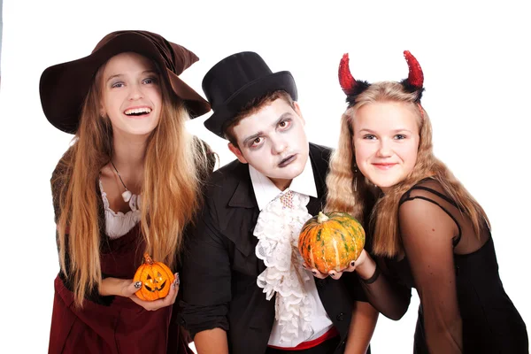 Teenagers dressed in costumes for Halloween against white backg — Stock Photo, Image