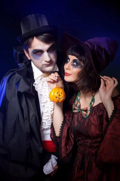 Man and woman wearing as vampire and witch. Halloween — Stock Photo, Image