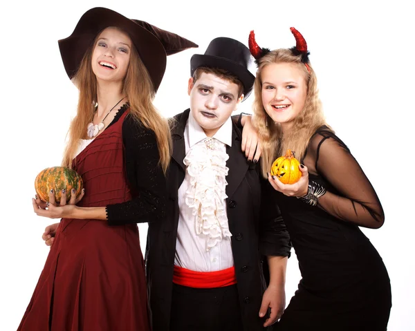 Teenagers dressed in costumes for Halloween against white backg — Stock Photo, Image