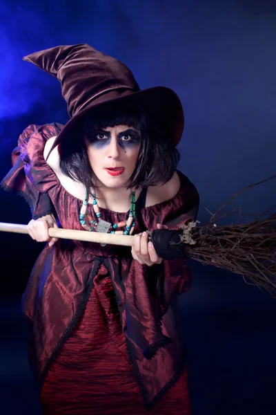 Young woman wearing halloween witch costume — Stock Photo, Image