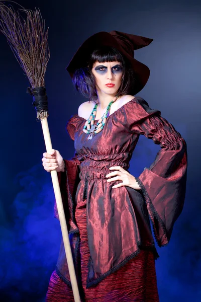 Young woman wearing halloween witch costume — Stock Photo, Image