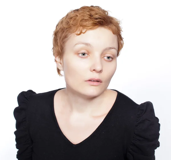 Frau mit traurigem Gesichtsausdruck isoliert auf weiß — Stockfoto