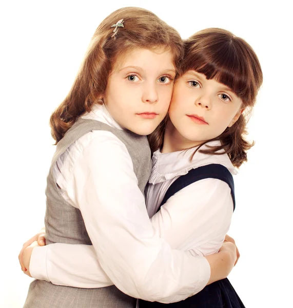 Two little girls talking. Isolated on white — Stock Photo, Image