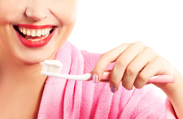 Woman cleaning teeth — Stock Photo, Image