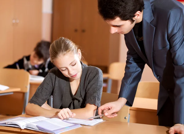 Teacher explaining — Stock Photo, Image