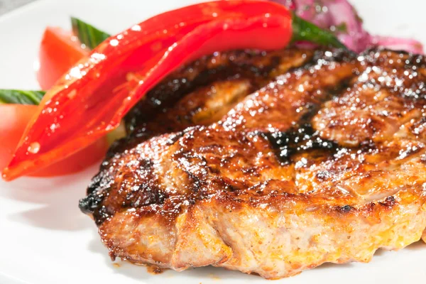 Gourmet grilled steak on a plate — Stock Photo, Image