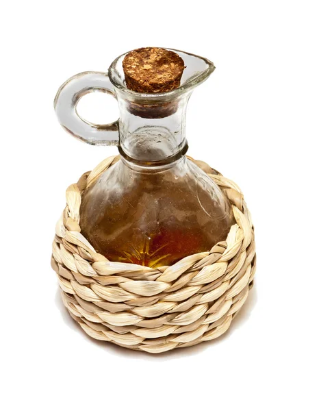 Proutěný láhev s olejem — Stock fotografie