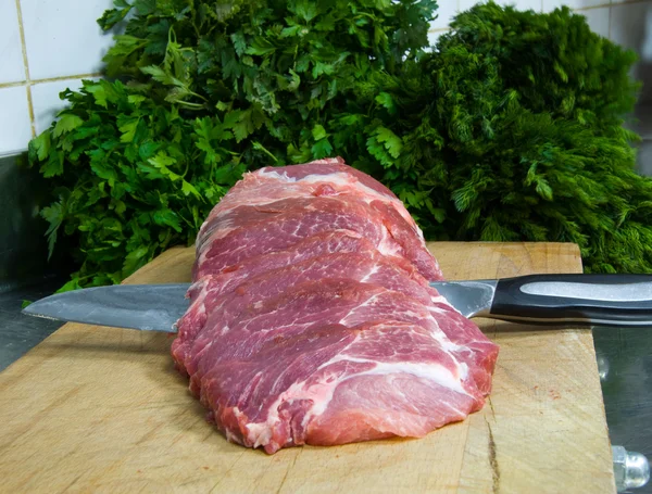 Preparação para fritar um bife — Fotografia de Stock