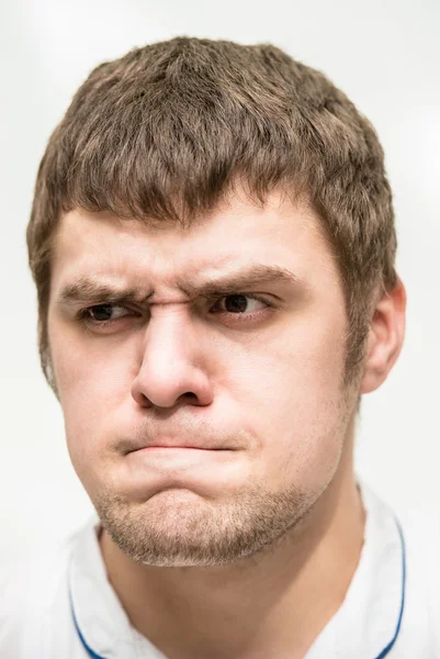 Grimace on his face — Stock Photo, Image