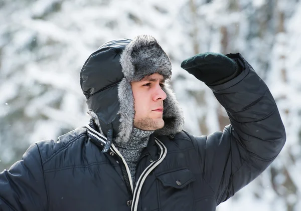 Man in a fur winter hat — Stock Photo, Image