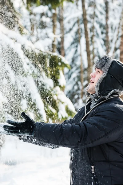 Man throws the snow — Stock Photo, Image