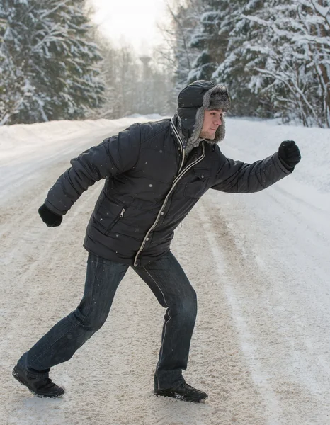 Man in a fur winter hat — Stock Photo, Image