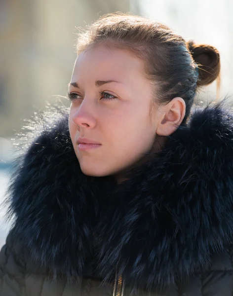 Girl in a fur collar — Stock Photo, Image