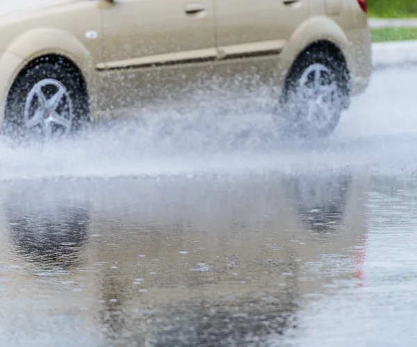 Spray from the car — Stock Photo, Image