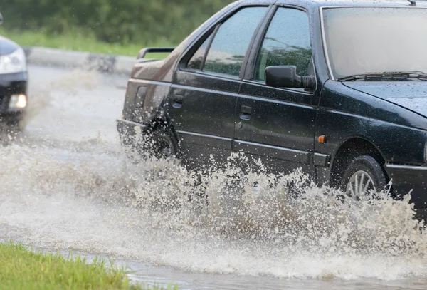 Spray from the car — Stock Photo, Image