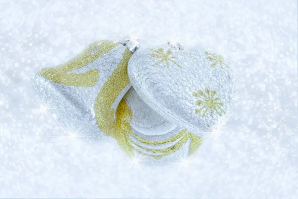 Christmas decorations on a background of brilliant snow — Stock Photo, Image